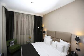 Фото номера Одноместный номер Делюкс с видом на город Отель North Avenue Hotel г. Ереван 3