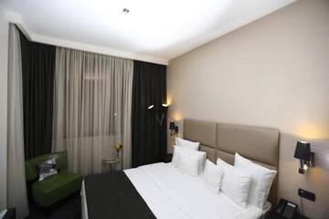 Фото номера Одноместный номер Делюкс с видом на город Отель North Avenue Hotel г. Ереван 5