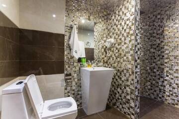 Фото номера Люкс (для 4 взрослых) Отель Green Palace Hotel г. Ереван 9