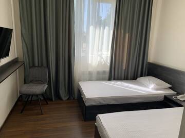 Фото номера Стандартный двухместный номер с 2 отдельными кроватями Отель NAVA HOTEL г. Ереван 9