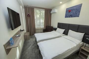 Фото номера Стандартный двухместный номер с 2 отдельными кроватями Отель Unique hotel г. Ереван 7