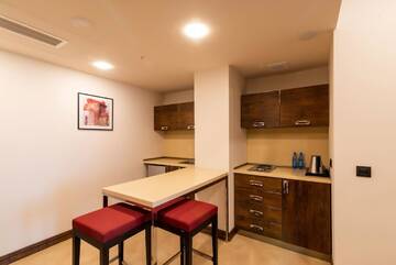 Фото номера Семейный люкс Отель Ramada Hotel &amp; Suites by Wyndham Yerevan г. Ереван 3
