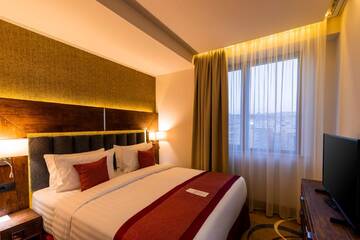 Фото номера Улучшенный люкс с 2 спальнями Отель Ramada Hotel &amp; Suites by Wyndham Yerevan г. Ереван 5