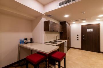 Фото номера Улучшенный люкс Отель Ramada Hotel &amp; Suites by Wyndham Yerevan г. Ереван 5