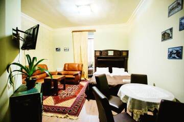 Фото номера Классический четырехместный номер Отель Studio Boutique Hotel г. Ереван 16