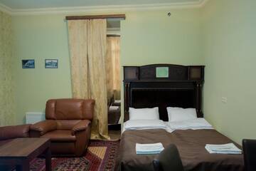 Фото номера Классический четырехместный номер Отель Studio Boutique Hotel г. Ереван 21