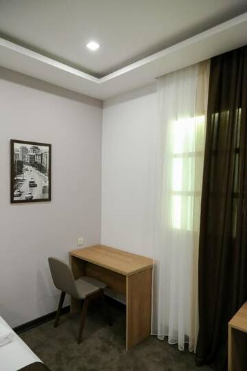 Фото номера Двухместный номер эконом-класса с 1 кроватью Отель Moscow Boutique Hotel г. Ереван 7