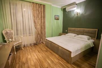 Фото номера Двухместный номер Делюкс с 1 кроватью Отель Nork Hotel г. Ереван 5