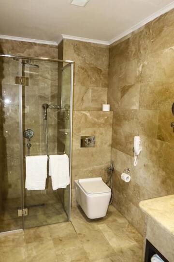 Фото номера Двухместный номер с 2 отдельными кроватями Отель Konyak Hotel г. Ереван 9