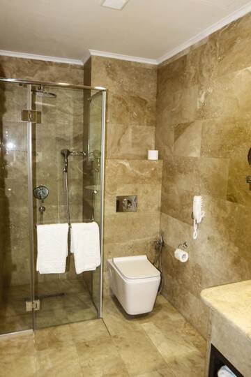Фото номера Двухместный номер с 2 отдельными кроватями Отель Konyak Hotel г. Ереван 5