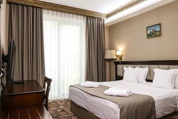 Фото номера Двухместный номер с 1 кроватью Отель Konyak Hotel г. Ереван 2