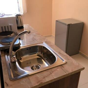 Фото номера Бюджетный двухместный номер с 2 отдельными кроватями Отель Biotech Guest Room г. Ереван 11