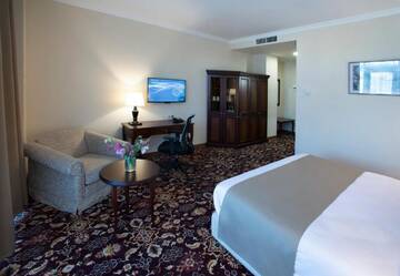 Фото номера Номер с кроватью размера «king-size» Отель Ani Grand Hotel Yerevan г. Ереван 6