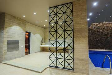 Фото номера Четырехместный номер с сауной и собственным бассейном Отель Ibiza Hotel г. Ереван 12
