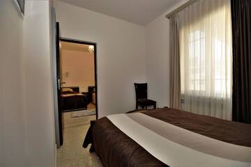 Фото номера Люкс с 2 спальнями Отель Comfort House Hotel and Tours г. Ереван 4