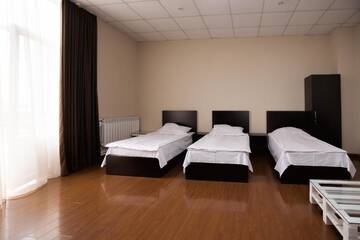 Фото номера Четырехместный номер с балконом Отель Benefice Mini-Hotel &amp; Tours г. Ереван 9