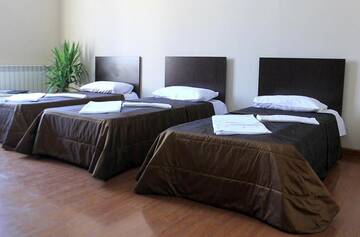 Фото номера Четырехместный номер с балконом Отель Benefice Mini-Hotel &amp; Tours г. Ереван 8