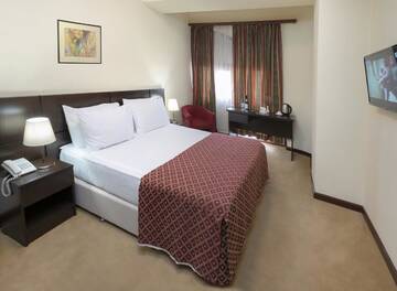 Фото номера Стандартный одноместный номер Отель Ani Central Inn г. Ереван 2