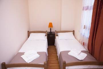 Фото номера Двухместный номер с 2 отдельными кроватями Апарт-отели Aurora Hotel г. Ереван 3