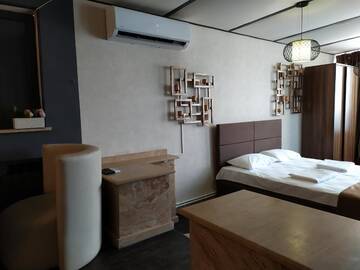 Фото номера Двухместный номер Делюкс с 1 кроватью Отель Hotel Tigran Mets Yerevan г. Ереван 6