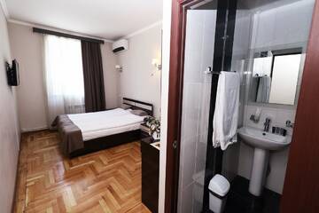 Фото номера Двухместный номер с 1 кроватью или 2 отдельными кроватями Отель Hotel Tigran Mets Yerevan г. Ереван 8