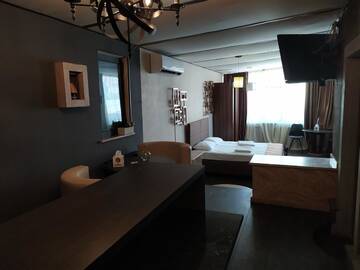 Фото номера Двухместный номер Делюкс с 1 кроватью Отель Hotel Tigran Mets Yerevan г. Ереван 2