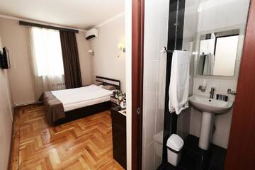 Фото номера Двухместный номер с 1 кроватью или 2 отдельными кроватями Отель Hotel Tigran Mets Yerevan г. Ереван 12