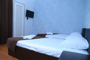 Фото номера Стандартный двухместный номер с 2 отдельными кроватями Отель Hotel Merien г. Ереван 6